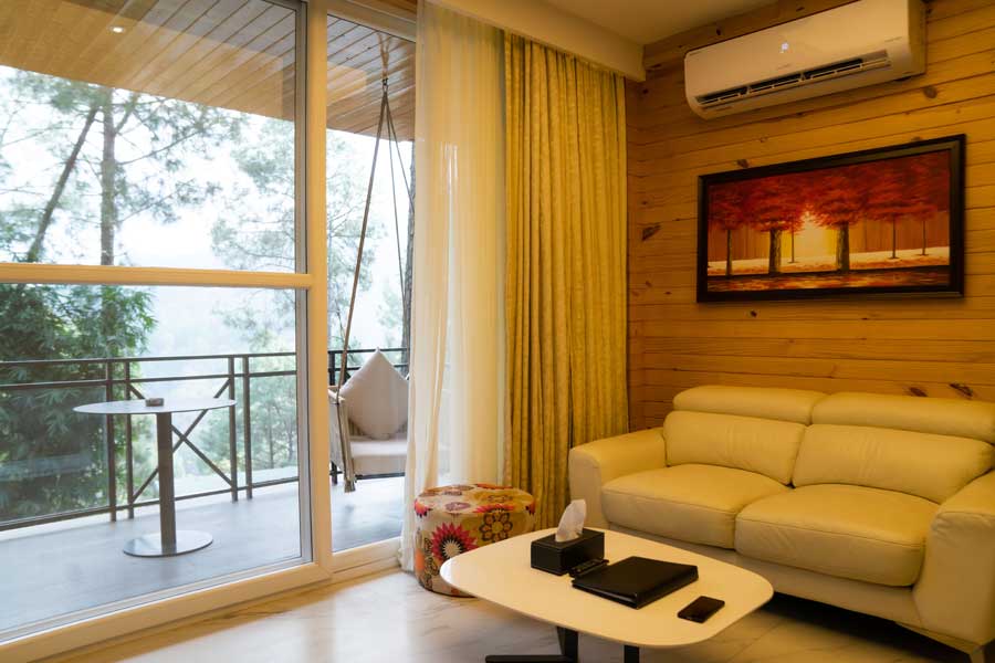 kasauli-hills-resort-queen-suite-luxury-sitting-area-with-nature-view